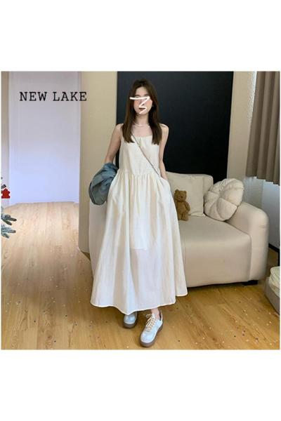 NEW LAKE白色茶歇吊带连衣裙子女早春2024新款夏季高级感法式气质甜美长裙