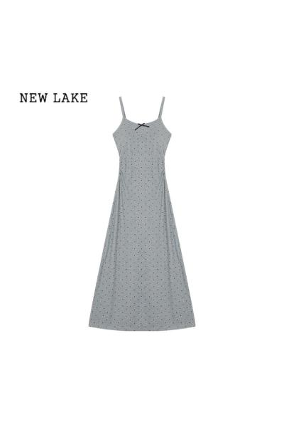 NEW LAKE法式茶歇蝴蝶结波点吊带连衣裙女夏季气质收腰A字包臀裙