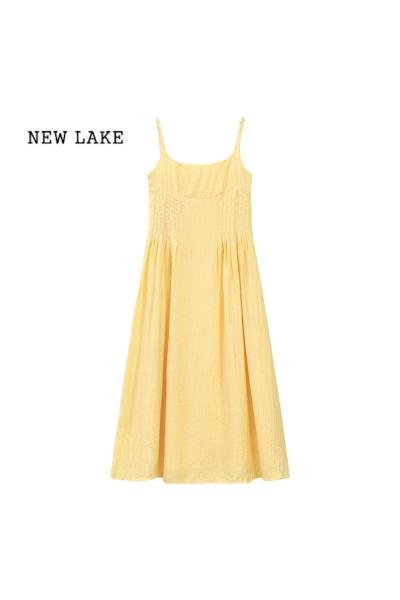 NEW LAKE温柔风黄色吊带连衣裙女夏季法式气质收腰显瘦A字裙海边度假长裙