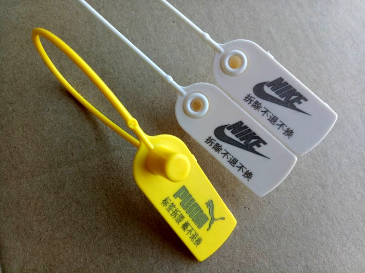 衣服一次性防盗扣塑料封条鞋包防伪防拆防调包扣吊牌扎带标签扣