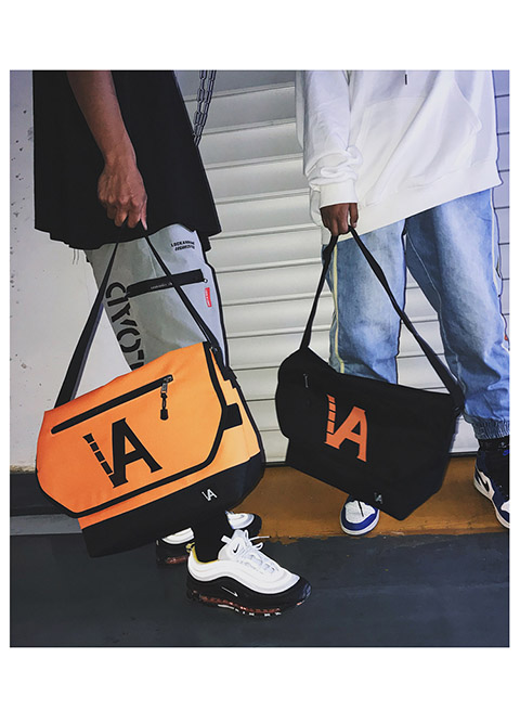 潮牌单肩斜挎包男士包包运动风嘻哈街头休闲原宿邮差包女情侣骑行 桔