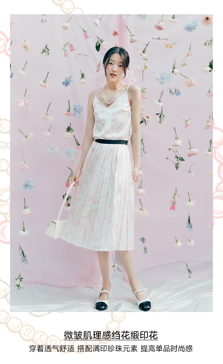 韩都衣舍中长款镂空百褶裙女2021夏季新款宽松a字高腰满印半身裙uf