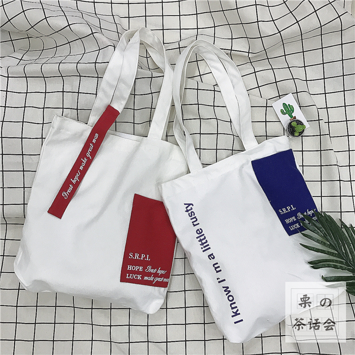 ins日系休闲少女软妹帆布包英文字母口袋撞色学生手提单肩包女包