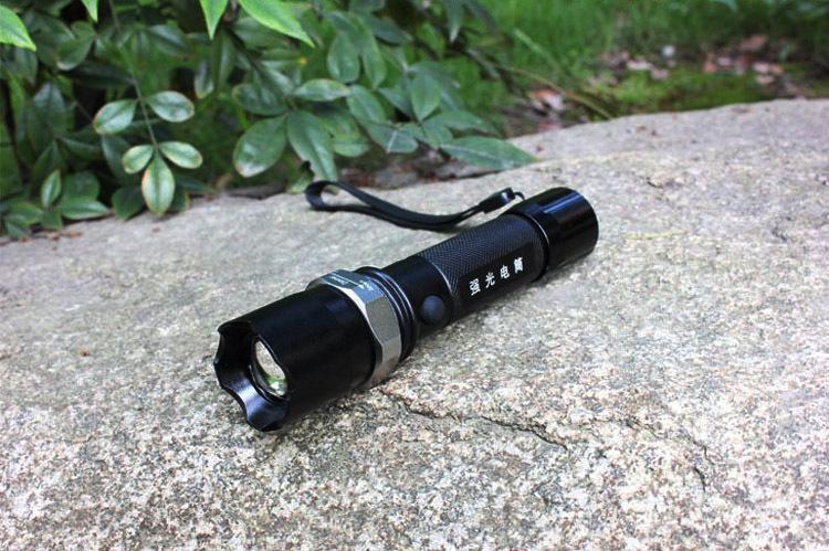 《特价5800毫安锂电池100w强光变焦铝合金充电手电筒led1101手电筒