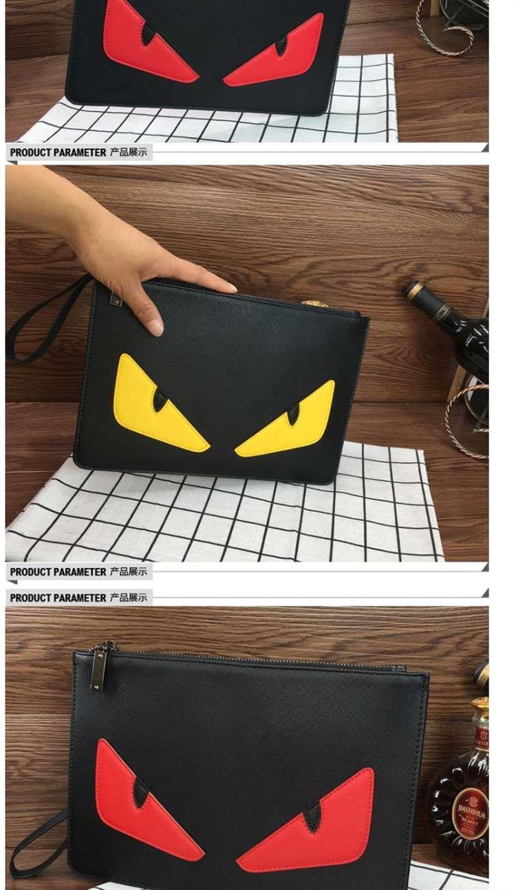 领头鸟小怪兽手拿包大容量恶魔眼睛休闲信封青年ipad