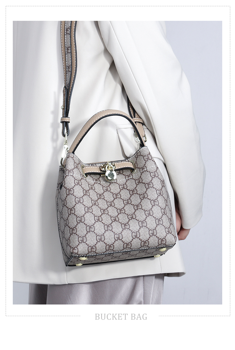 狮壹(lion one)轻奢品牌宽带水桶包大容量女包上新小包包气质百搭手提