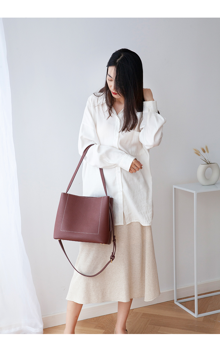 曼尼琼诗轻奢上班通勤女包2020新款斜挎真皮托特包小众设计软皮单肩包