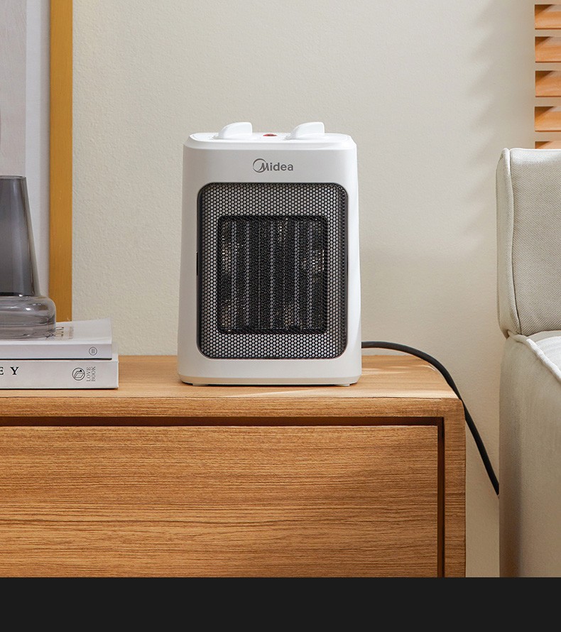 美的midea取暖器电暖器电暖气片家用热风机冷暖两用桌面速热节能电
