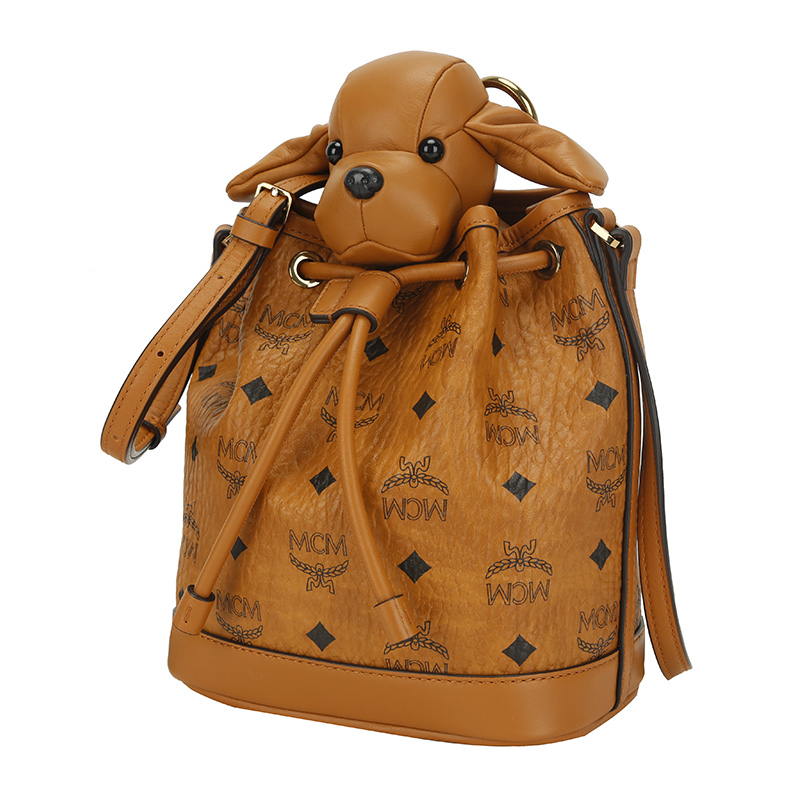 mcm女士棕色人造革可爱玩偶小狗系列单肩斜挎包桶包礼物送女友myz8axl