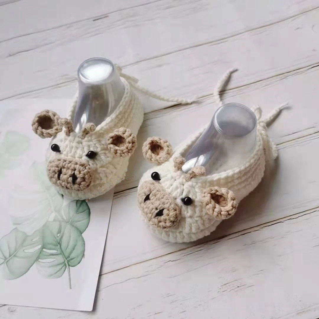 手工编织新生婴儿小牛造型软底步前毛线鞋满月百天周岁宝宝眉眼鞋小牛