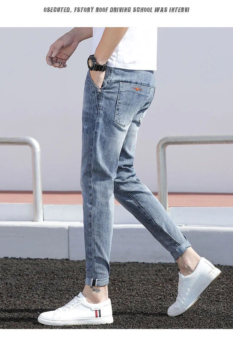 鸿星尔克加油牛仔裤男士修身小脚潮牌浅色百搭破洞休闲裤九分裤高弹力