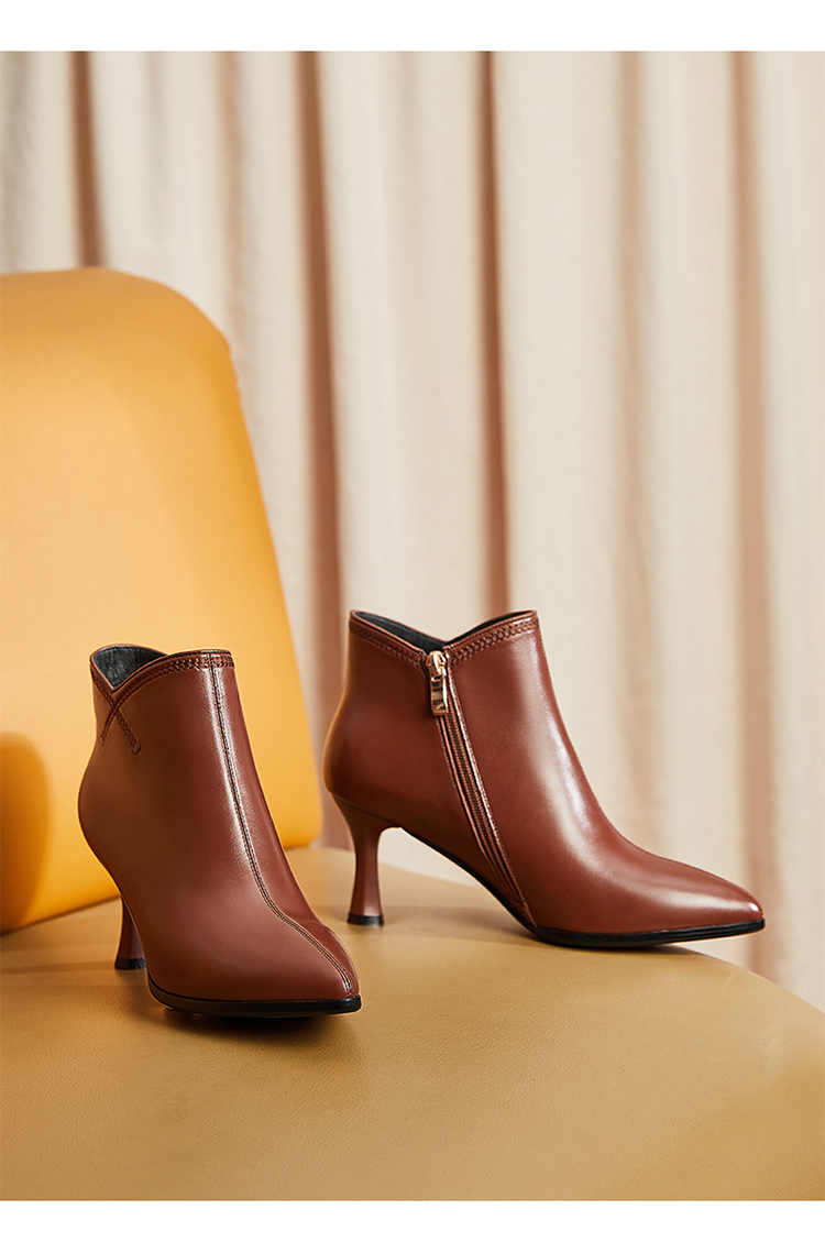 康奈女鞋冬季新款女士高跟时装靴简约尖头细跟侧拉链纯色真皮通勤女短